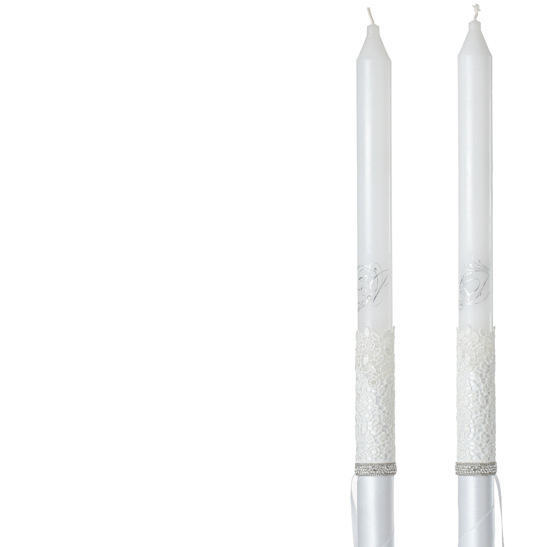 wedding ritual candles with white satin and lace decoration and engraved initials