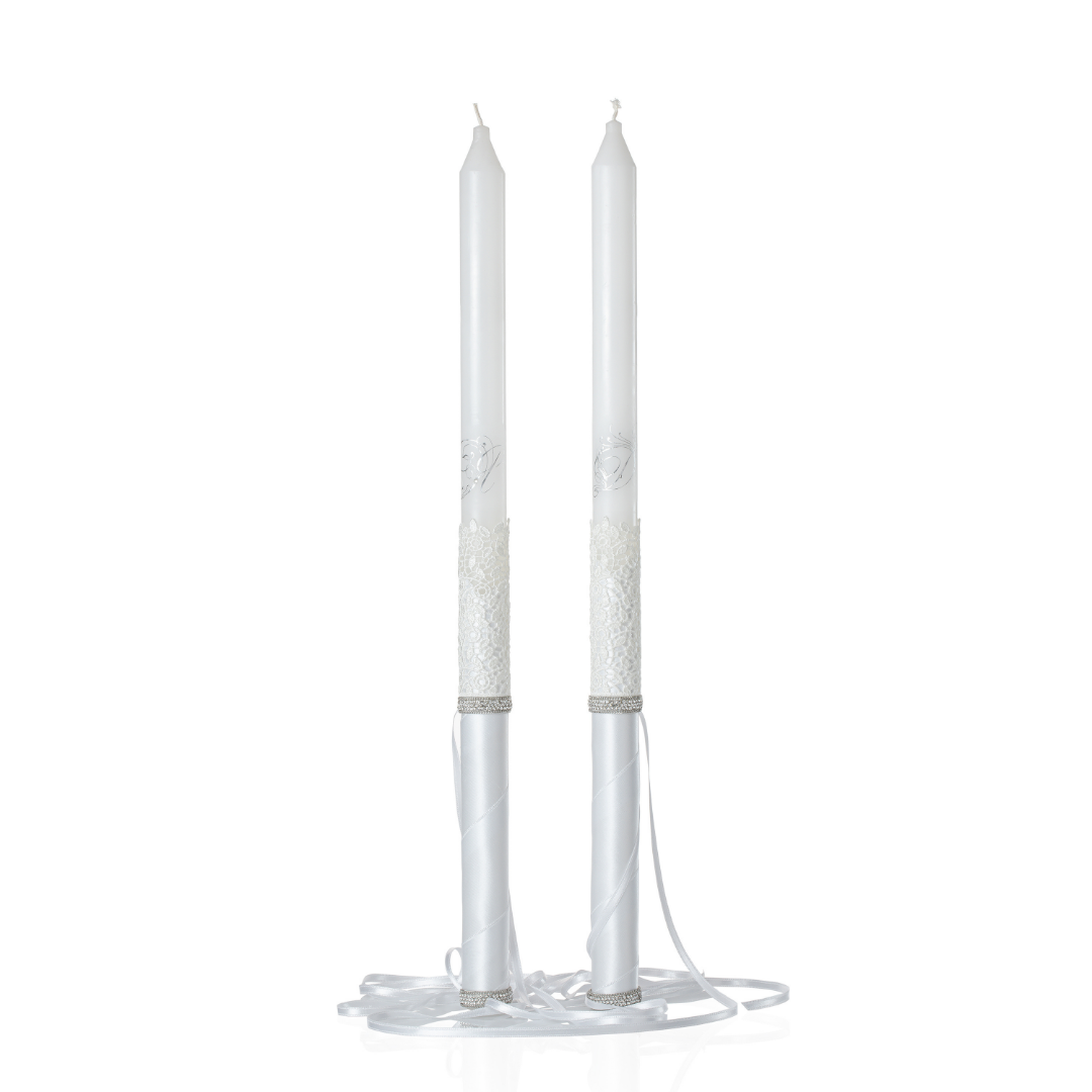 wedding candles with white satin and lace decoration and engraved initials