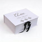 Large white box with personalization with acrylic glass in silver and a sagegreen ribbon 
