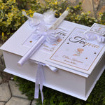 White baptismbox with personalized items for keepsake with white angels and feathers 