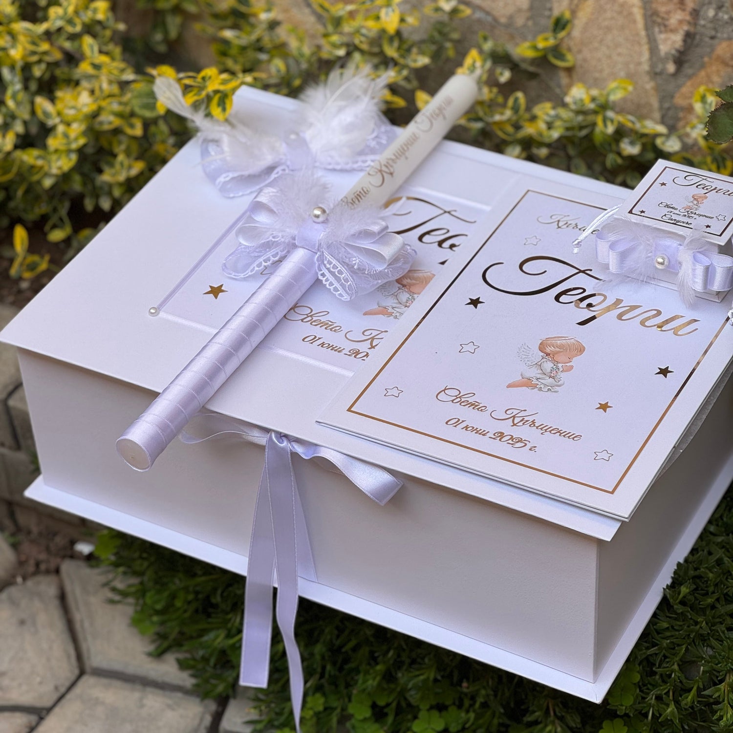White baptismbox with personalized items for keepsake with white angels and feathers 