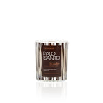 Palo Santo wooden wick candle in textured glass on white background
