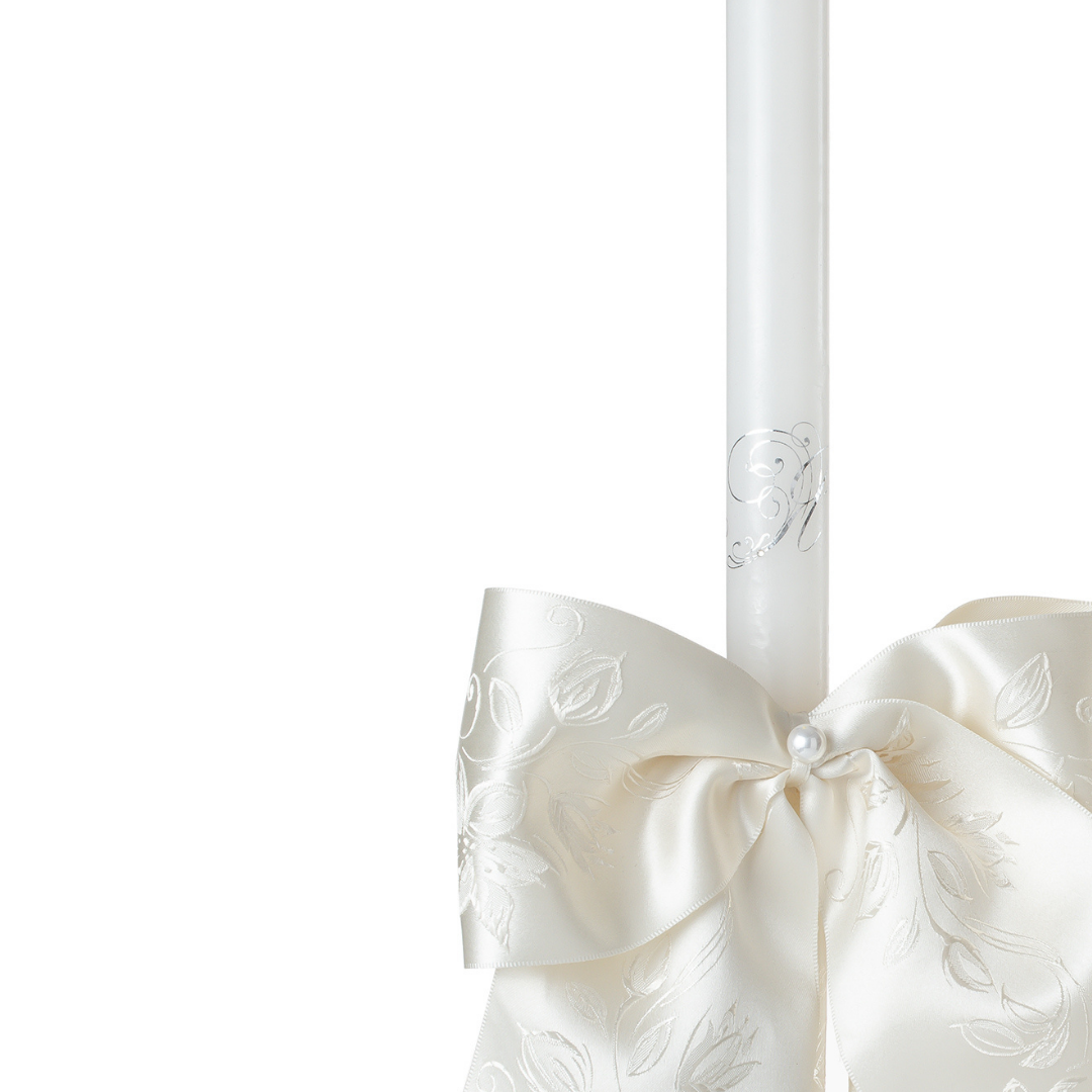 orthodox wedding ritual candles with ivory ornamental satin bow and engraved initials for church ceremony