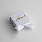 White box with acrilic name, with white bow