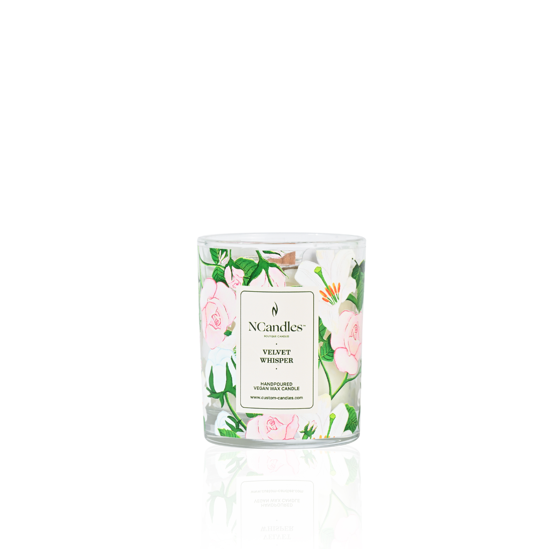 Candle with floral design and 'NCandles' branding on a white background
